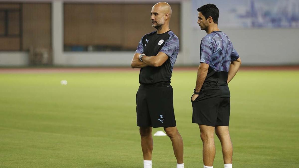 Pep Guardiola and Mikel Arteta